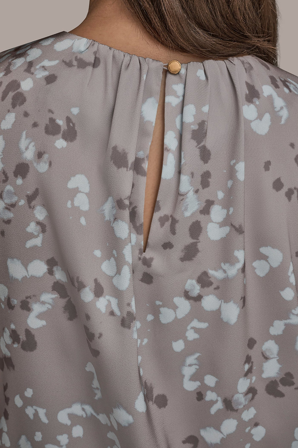 Donna Karan | FLORAL CAP SLEEVE TWIST BLOUSE